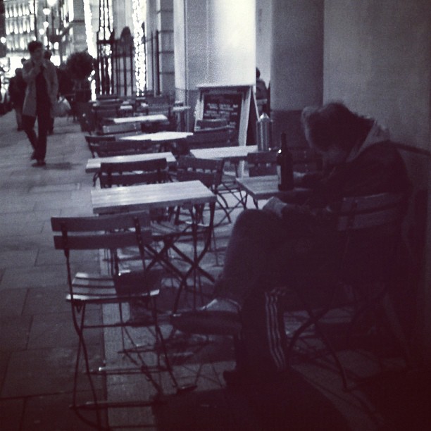 Table for one. #london #street #night #people #bw