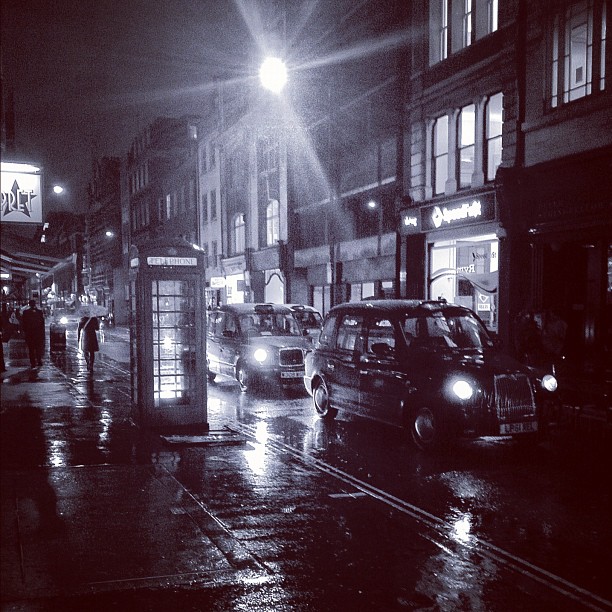 Here comes the #rain again. #london #soho #street #night  #bw