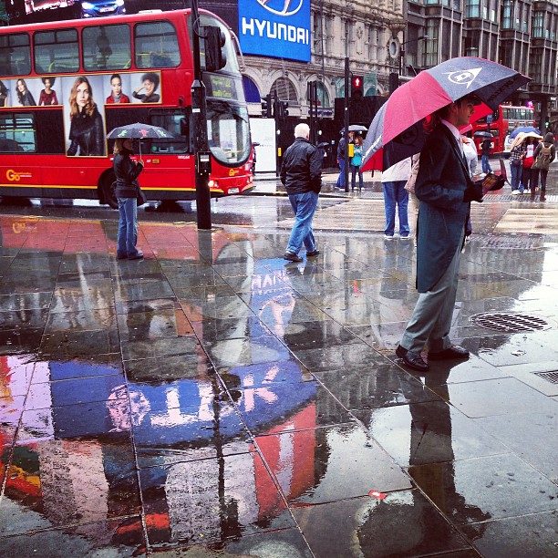 More reflections from #piccadilly. #londone#londonpop #london_only #ig_uk #ig_london #street #streetphoto #streetphotography  #igerslondon #igers_london #city #capital #rain #reflection #iphoneonly