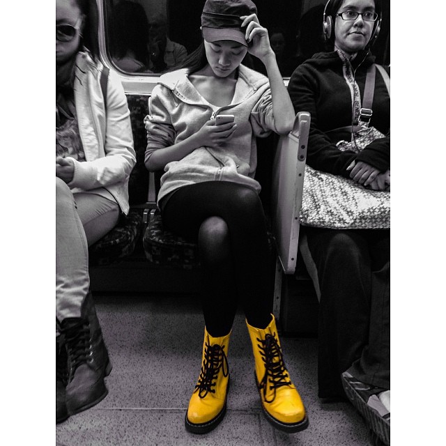 Not a huge fan of #colorsplash, but those #yellow #boots.. #londonunderground #tube #underground #london#londonpop #london_only #ig_uk #ig_london #bnw_city #bnw_london #bw #bnw #blackandwhite #street #streetphoto #streetphotography #streetphotography_bw #igerslondon #igers_london #iphoneonly
