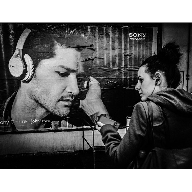 'Mmm.. I love your sound, girl.. ' #dblportrait #london#londonpop #london_only #ig_uk #ig_london #bnw_city #bnw_london #bw #bnw #blackandwhite #igerslondon #igers_london #street #streetphoto #streetphotography #streetphotography_bw #tube #underground #londonunderground #iphoneonly #poster