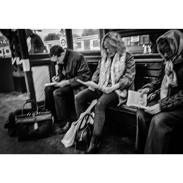 Morning reading club. Smudged. #london#londonpop #london_only #ig_uk #ig_london #bnw_city #bnw_london #bw #bnw #blackandwhite #igerslondon #igers_london #street #streetphoto #streetphotography #streetphotography_bw #tube #underground #londonunderground