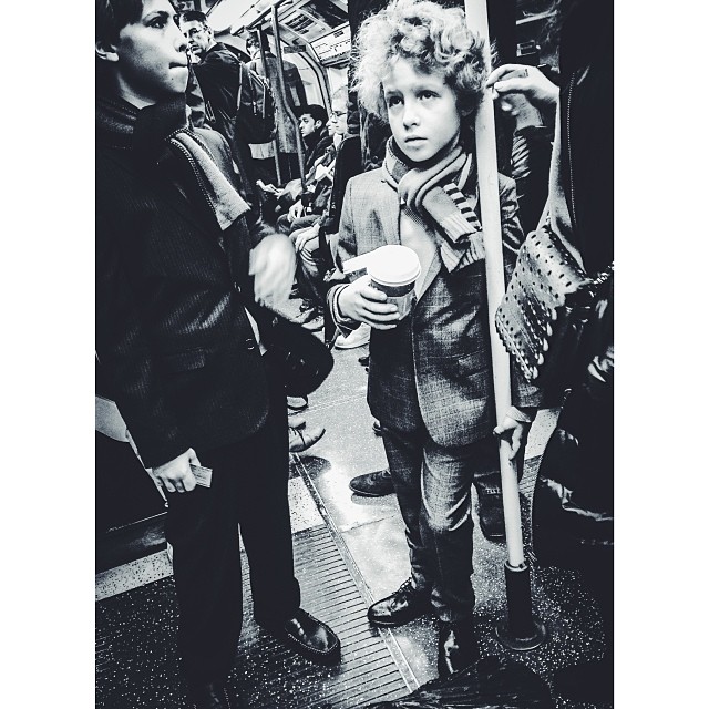 #Russian kids on morning train. #lookingsharp. #london#londonpop #london_only #ig_uk #ig_london #bnw_city #bnw_london #bw #bnw #blackandwhite #street #streetphoto #streetphotography #streetphotography_bw #tube #underground #londonunderground #iphoneonly