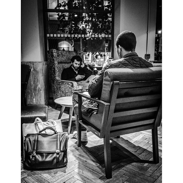 Opposite, but not together. #dblportrait #thelivesofthers #london#londonpop #london_only #ig_uk #ig_london #bnw_city #bnw_london #bw #bnw #blackandwhite #igerslondon #igers_london #street #streetphoto #streetphotography #streetphotography_b/w #coffeeshop #iphoneonly