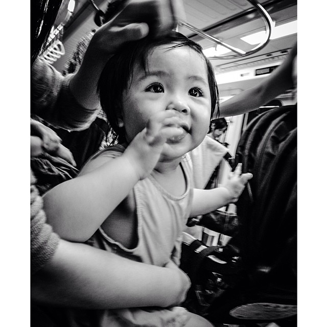 This little #cutie waved her hand and said Hi to me on the train today. #taipei #taiwan #bnw #bw #blackandwhite #bnw_city #bnw_taiwan #streetphoto #asia #metro #underground #cute #kid