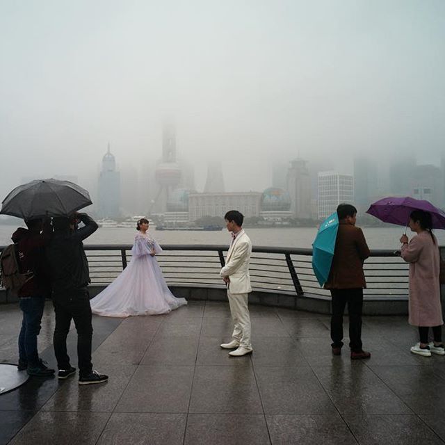 No matter the weather. #weddingphotography in #shanghai #china #thebund #leica #leicam9 #leicacamera #wedding